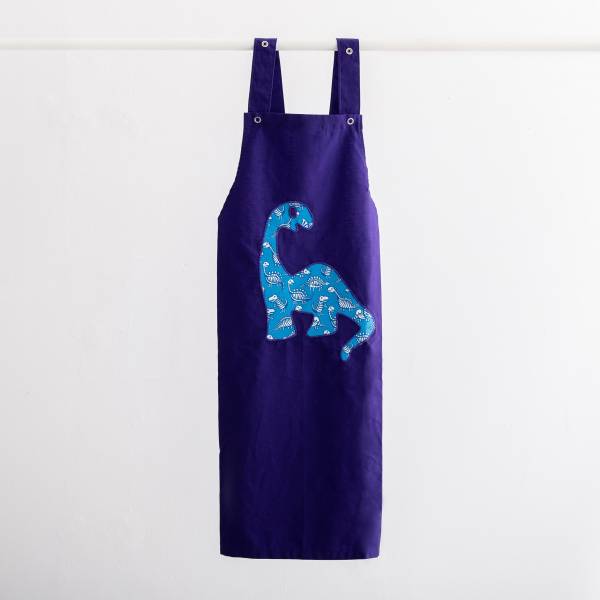 Childrens' apron with dinosaur on it.